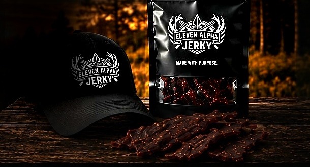 Eleven Alpha Jerky package, hat, and jerky at sunset